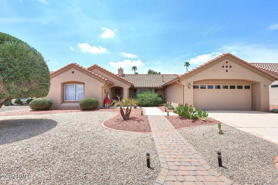 14641 W RAVENSWOOD Drive, Sun City West, AZ 85375 — photo 1 of 61