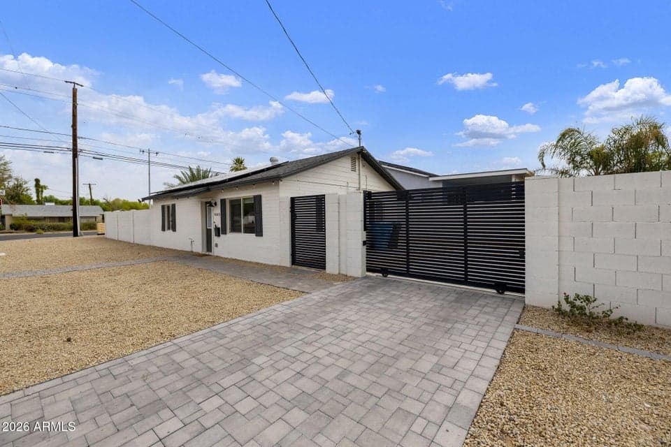 Entire property fenced in with new automated gate