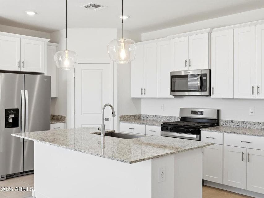 Photo is not of the actual home. Interior finishes and fixtures may vary.