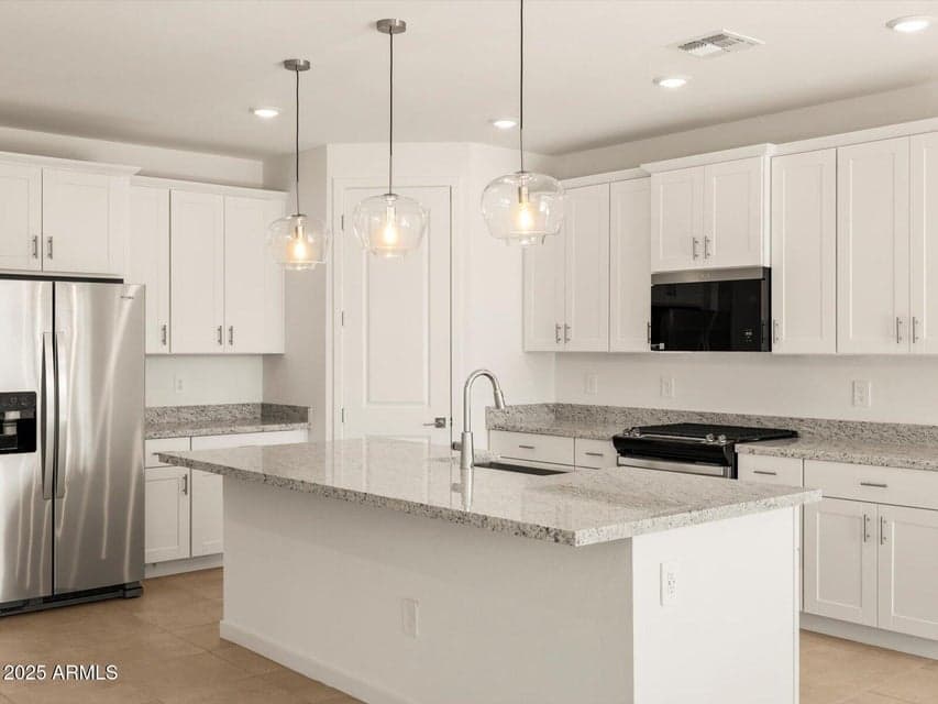 Photo is not of the actual home. Interior finishes and fixtures may vary.