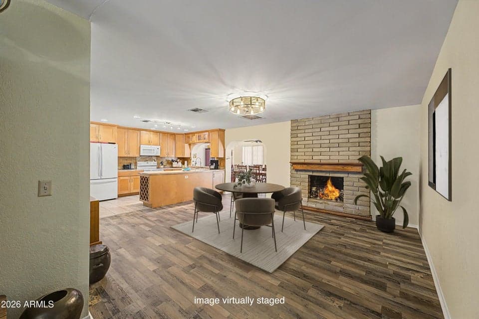 Virtual Staging: Spacious Dining Room with Wood Burning Fireplace