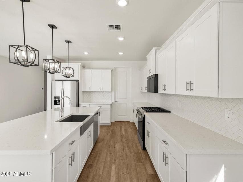 Photo is not of the actual home. Interior finishes and fixtures may vary.