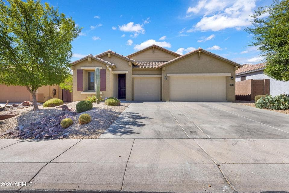 Welcome home to single-story living in the beautiful Cortessa community of Waddell.