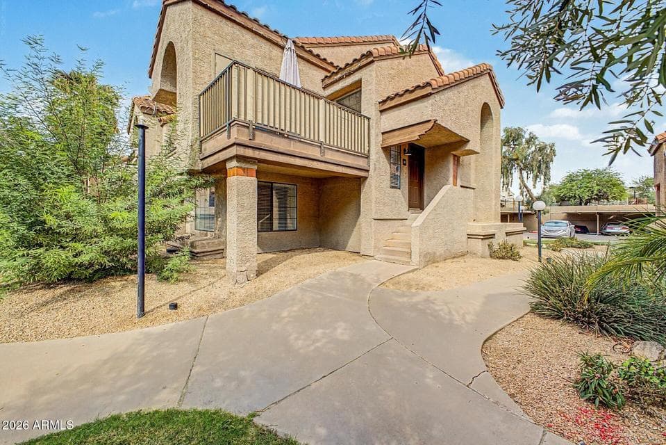 Situated with views of the greenbelt, pool, and Papago Park!