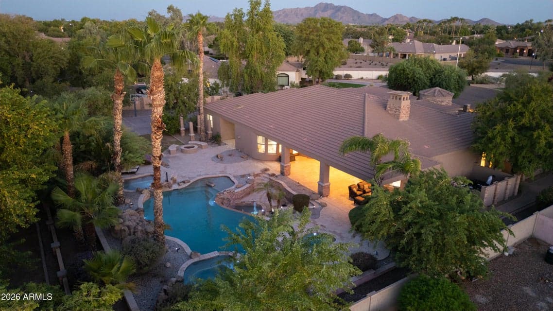 The gorgeous estate home in Circle G Homestead neighborhood is situated on nearly an acre